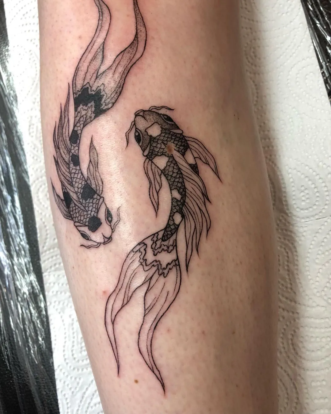 Yin and Yang Koi Fish Tattoos