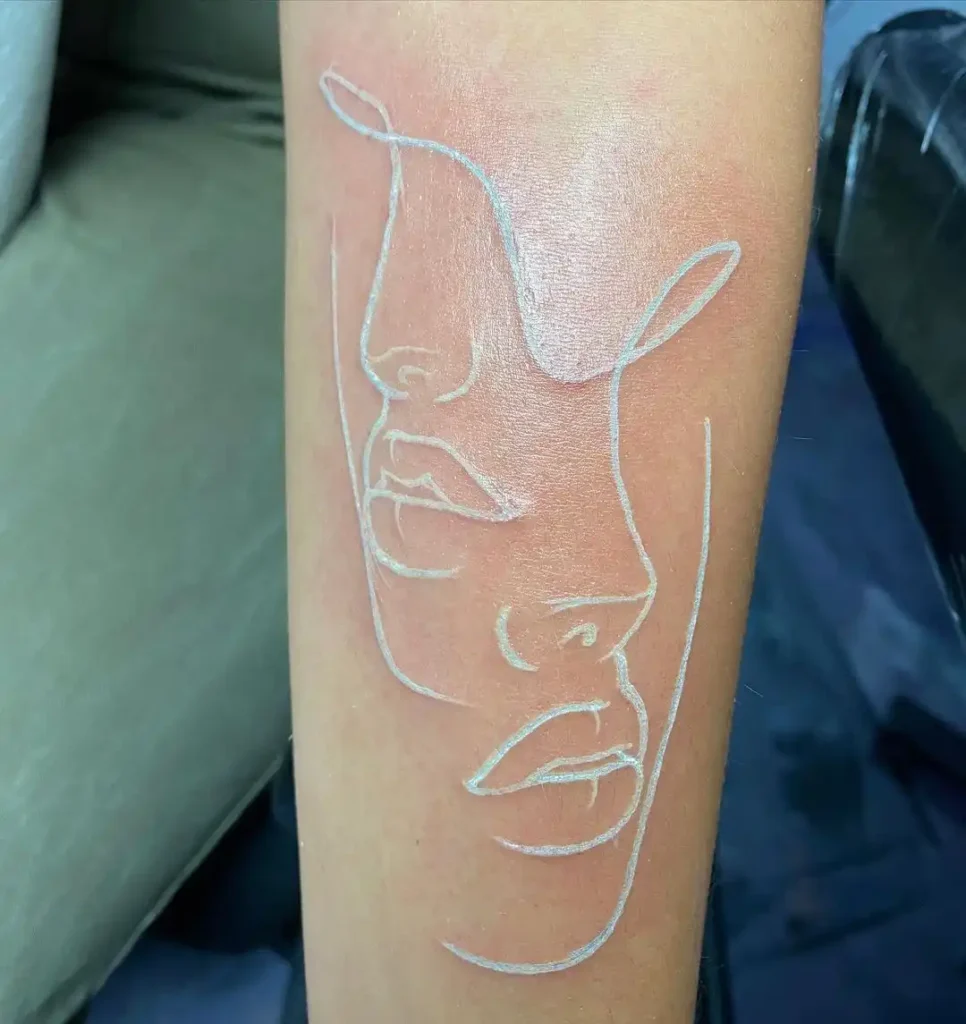 White Ink Tattoos design on White Skin