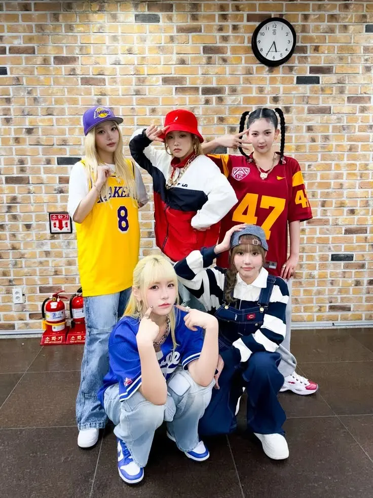 5 different females wearing kpop inspired outfits sporty looks.