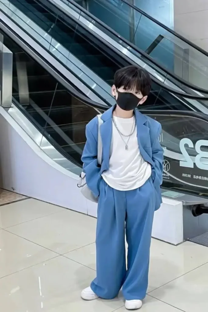 a kid wearing kpop inspired street style dress.