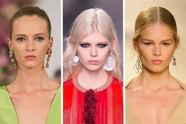 Three different actresses wearing different types of asymmetrical or mismatched earrings.