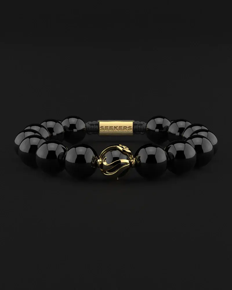 A unique black color stone bracelet made with gemstones.