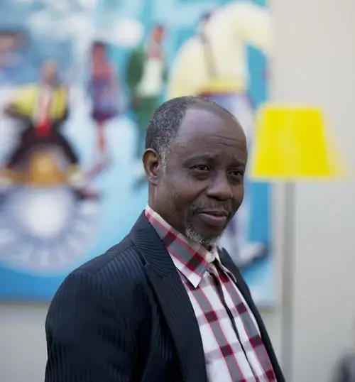 He is the famous black artist Chéri Samba.