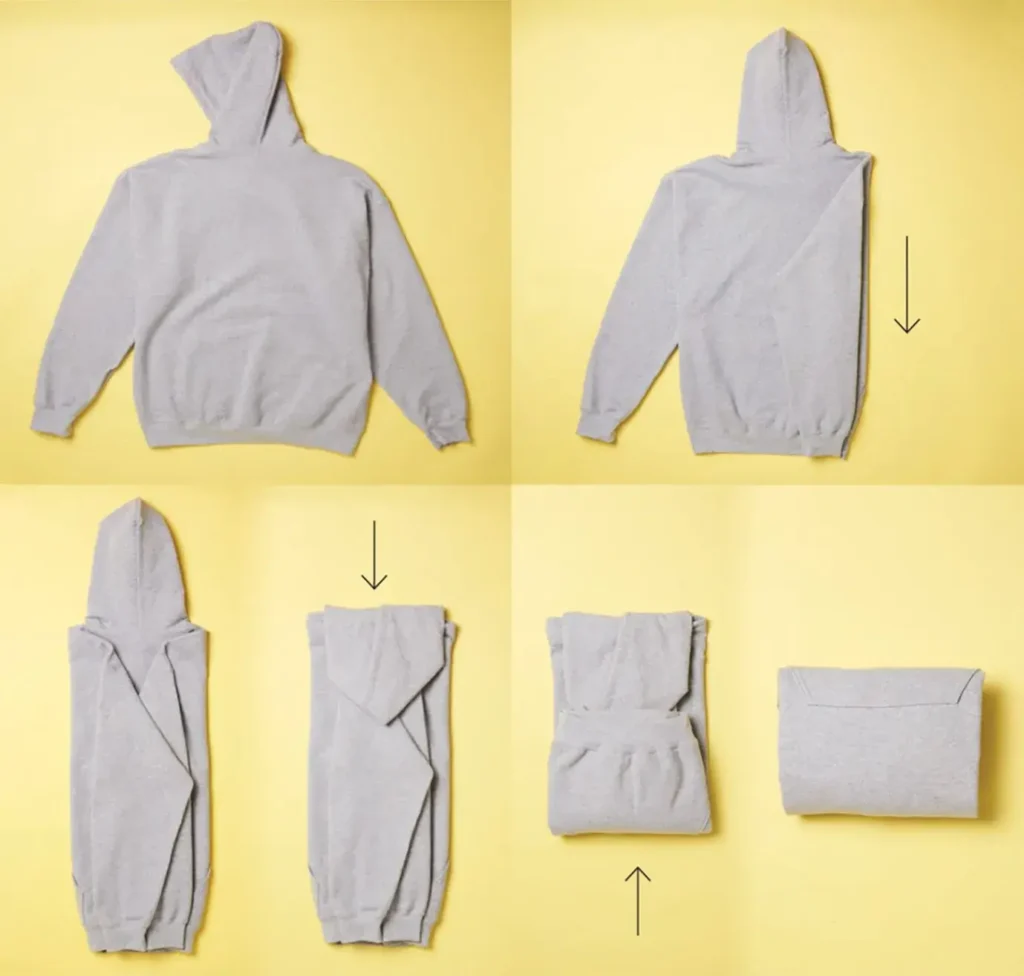 Seven-step visual guide demonstrating how to fold a two-toned hoodie for perfect storage.