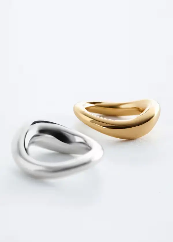 Two rings on a flat surface.