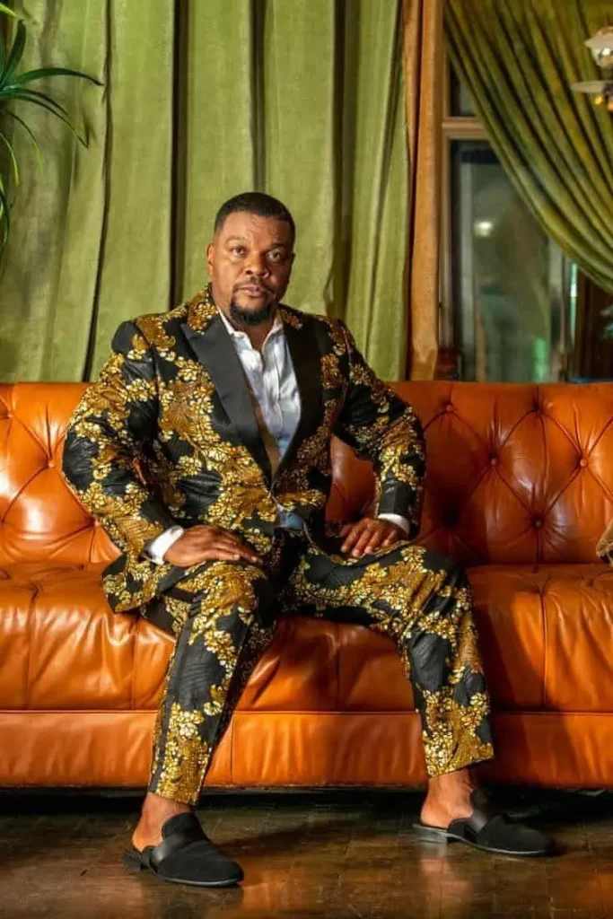 He is Kehinde Wiley, a famous artist.