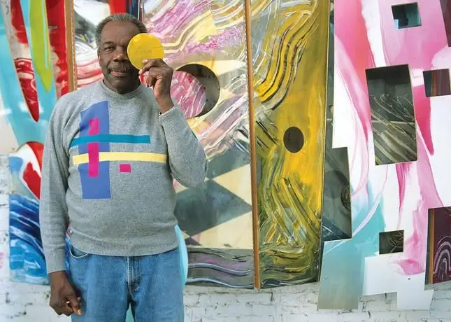 He is Sam Gilliam, a famous artist.