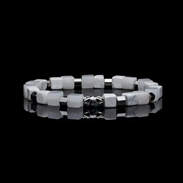 A unique white color beaded bracelet made with gemstones.