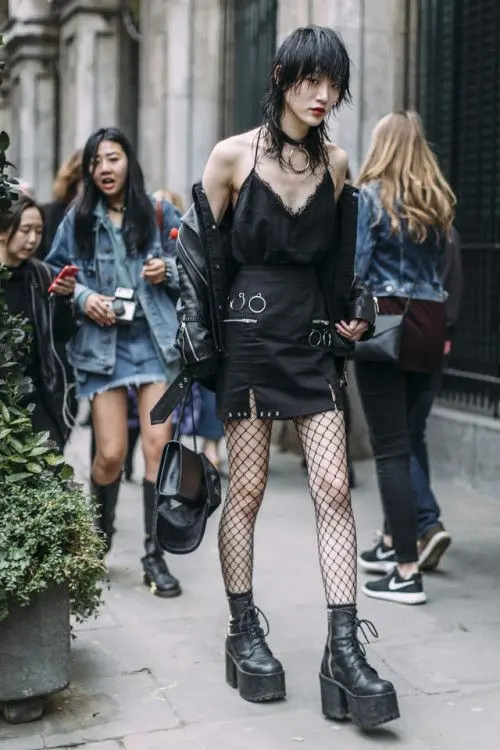 A girl wearing Dark Grunge Fashion clothes.