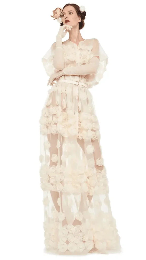 A model wearing norma kamali gown Diana Dress