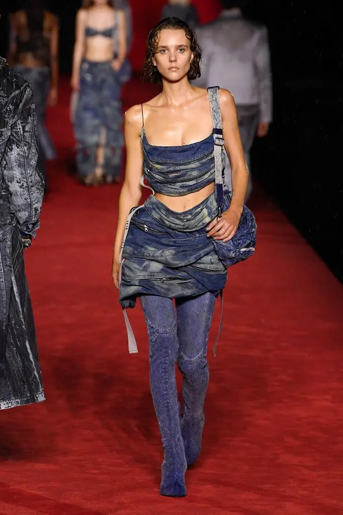 A model on ramp presenting Diesel — Glenn Martens, SS24 collection.