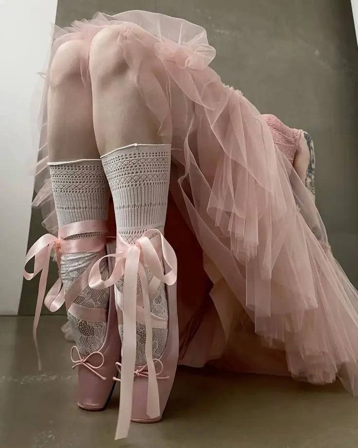 A girl wearing balletcore flats