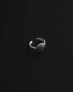 a adjustable ring with a dark background.