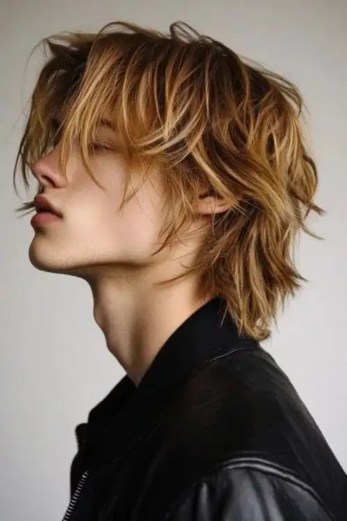 A boy with medium length wolf cut