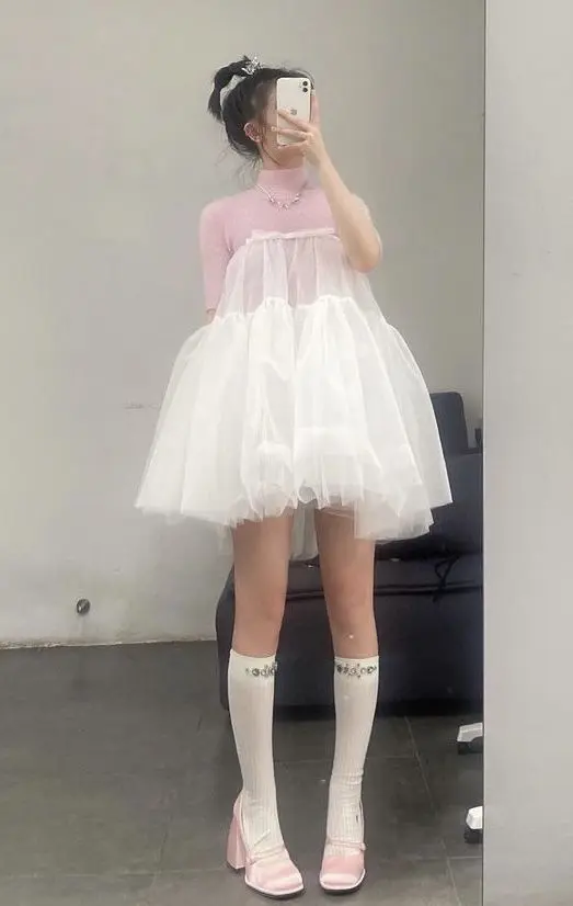 A girl in romantic balletcore look