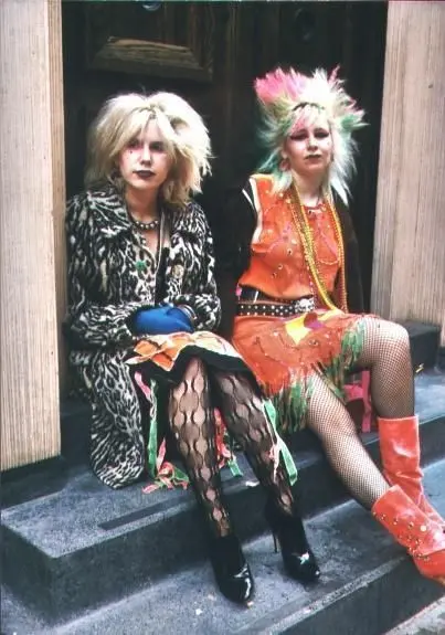 2 ladies sitting on a plane place