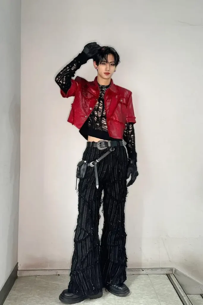 a boy in techwear dressing