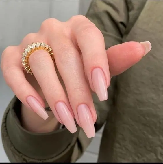 a girl hand with Coffin / Ballerina Nails Shape