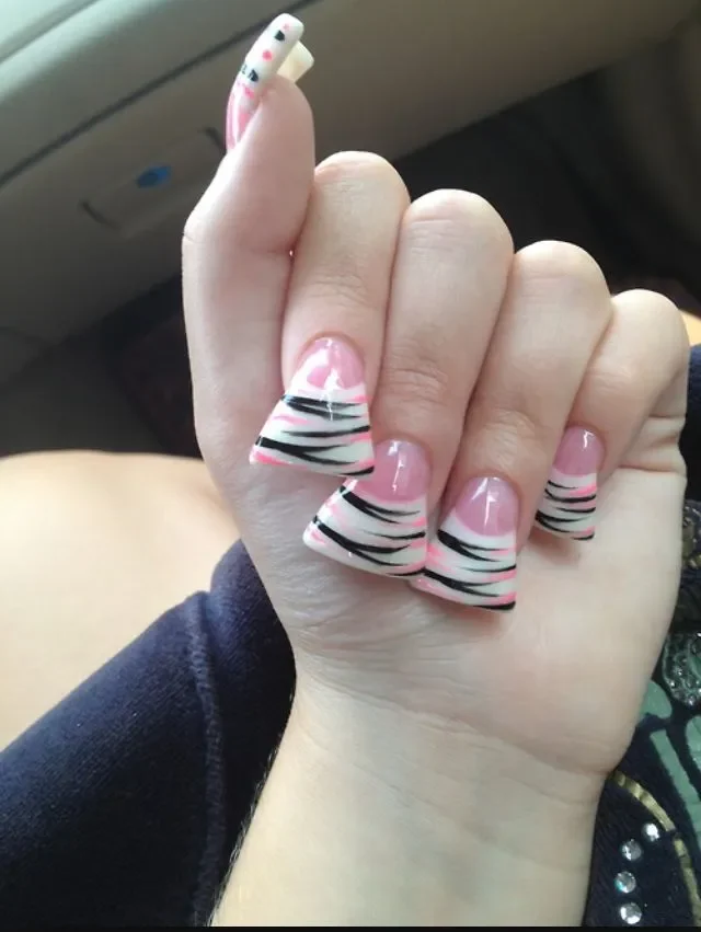 a girl one hand showing Flare nails or Duck Nails design