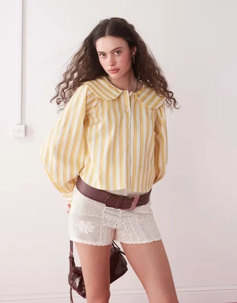 a girl with Peter Pan Collar shirt and shorts