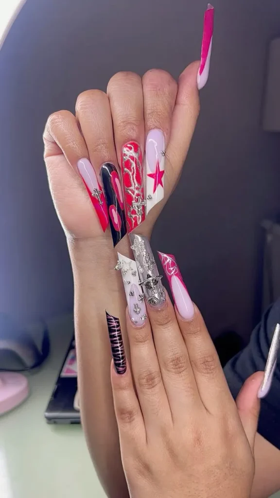 A girl's hands showing Lipstick Nails