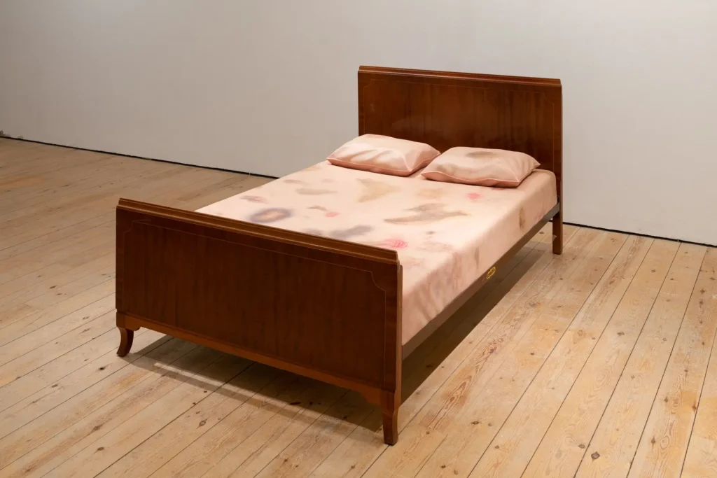 The Bed is meant to evoke difficult emotions. It addresses the dark realities that happen behind closed doors. It wouldn’t say one specific thing — it doesn’t tell a single story. It’s about the traumas that occur within a space that’s supposed to be safe and protective —the house, the bedroom and then the bed. These traumas can be psychological, physical, or both. The work speaks about violence experienced in the home — violence that is often hidden.