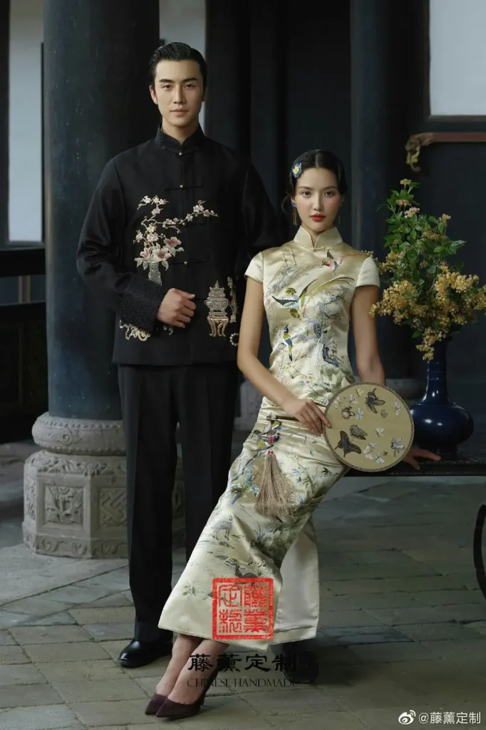 a girl and boy representing chinese style wedding outfit