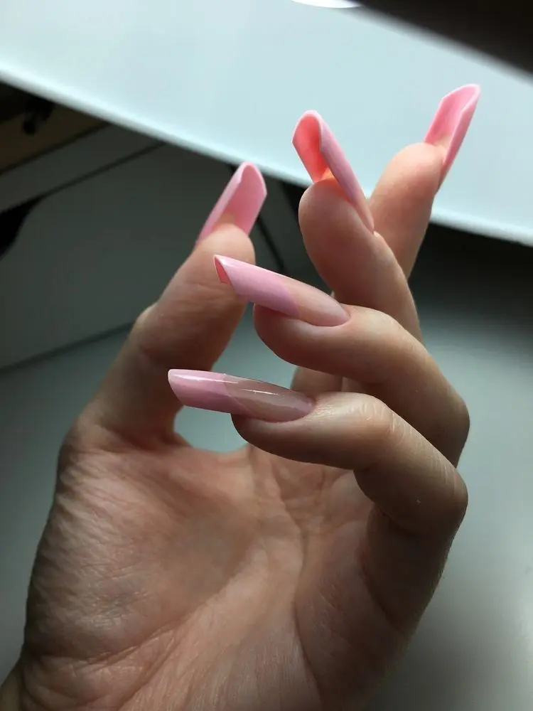 A girl nails with Pipe Nails design Shape