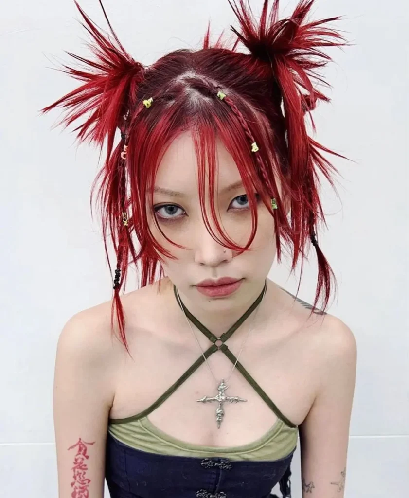 a girl showing pink dyed punk style hair