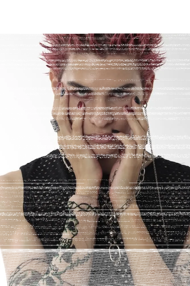 a man showing pink dyed punk hairstyle