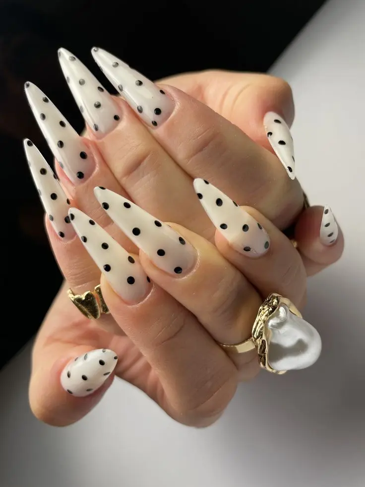 polka dot nail design on oval-shaped girls nails on both hands