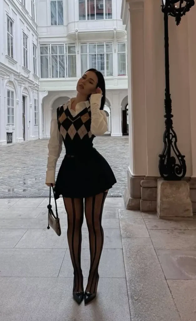 A girl is standing in Modern Secretary Glam office siren look