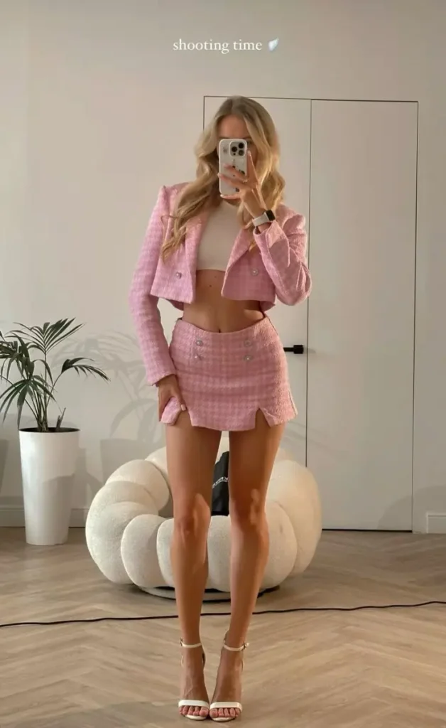 a girl in stylish pink dress