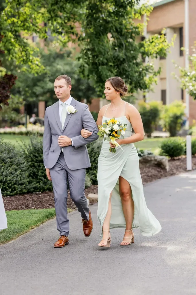 a grom and bridal in a asage green dres look
