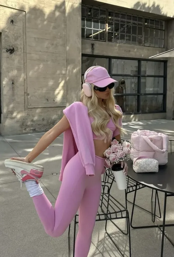 a barbie core sporty look of a girl