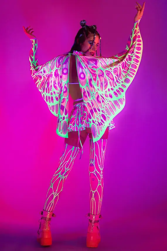 a girl showing rave fashion uv rays dress