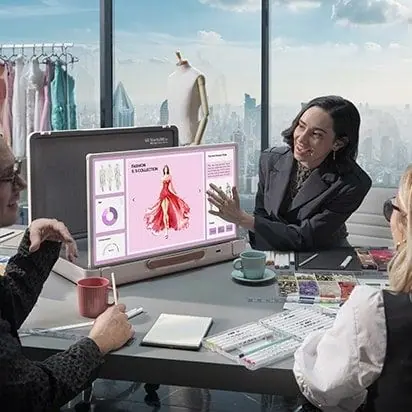 a girl designing dress on computer