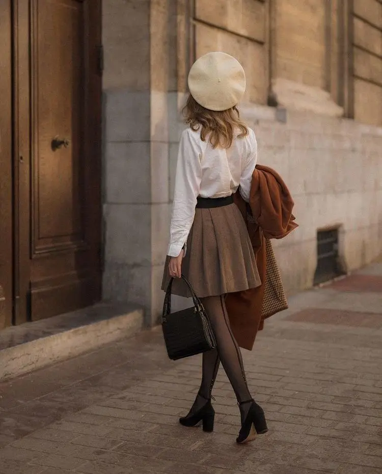 a girl in poetcore fashion