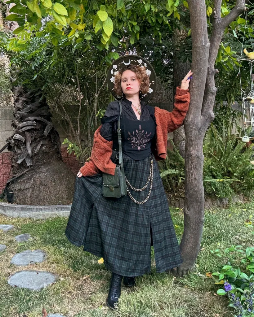 a grl with dark cottagecore aesthetic fashion