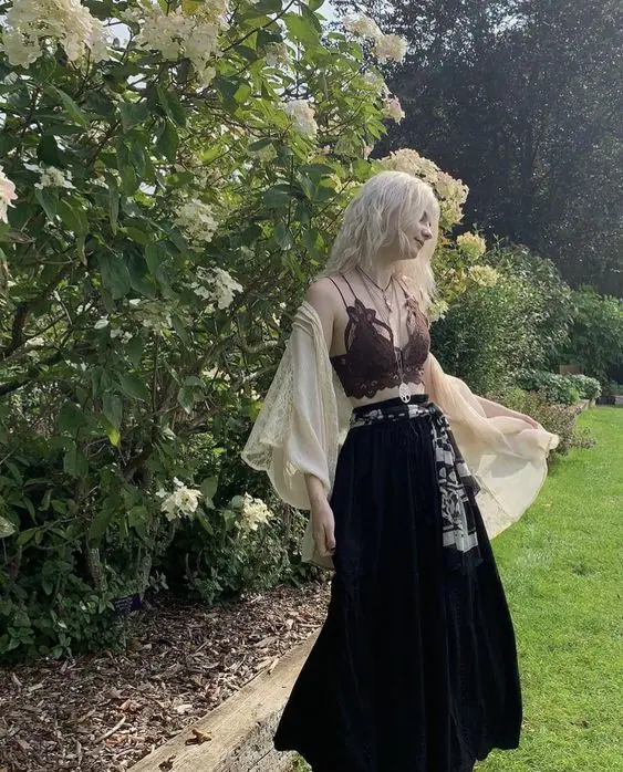 a girl wearing Dark Fairycore Aesthetic