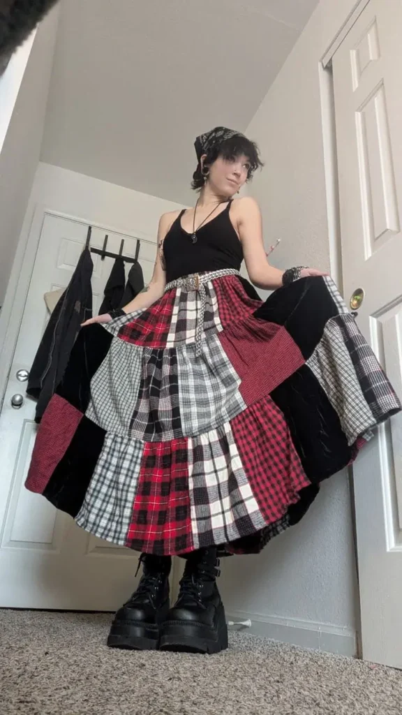 a girl wearing patch work dress