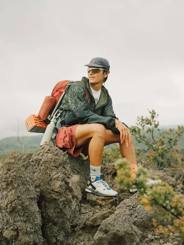 a man in camping wearing Layered Outdoor Look