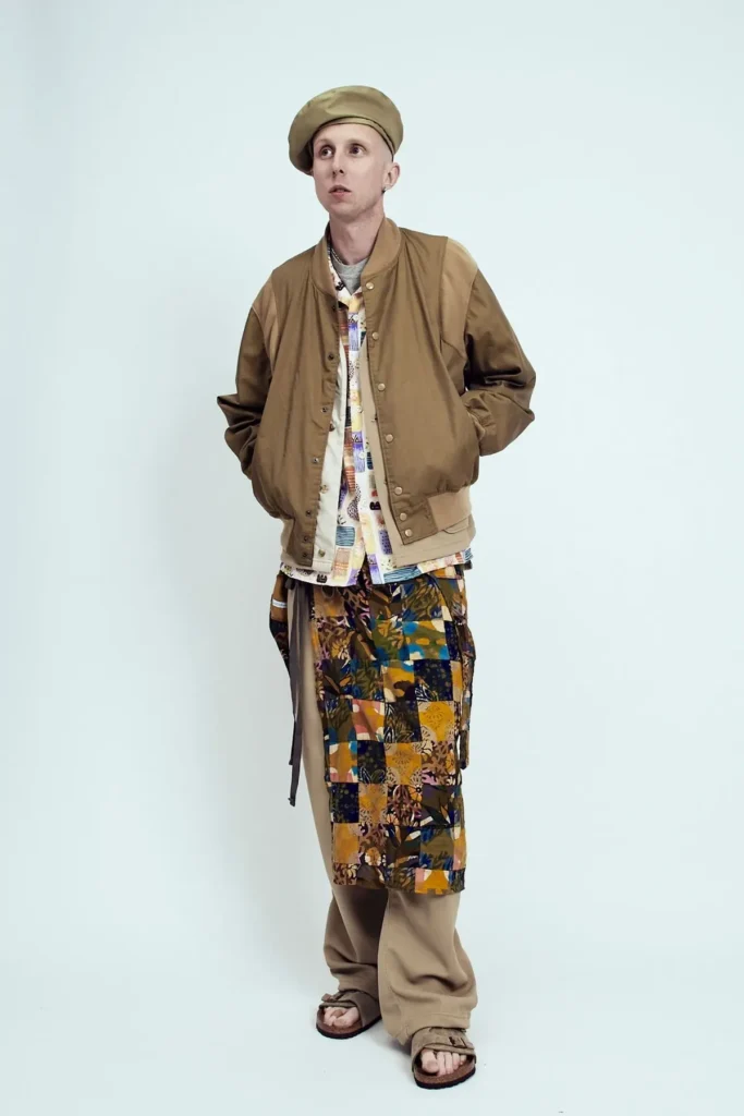 a man in Engineered Garments latest collection dressing