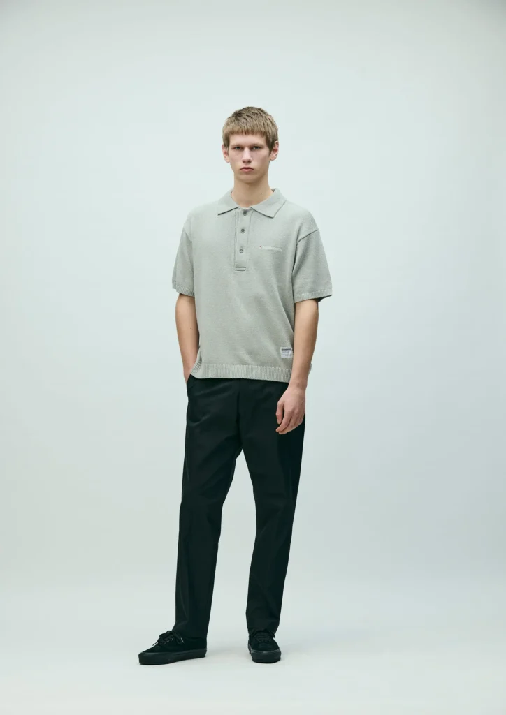 a man in neigborhood brand dressing