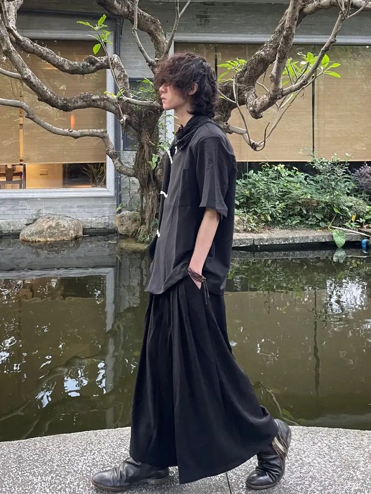 a boy in black Japanese Fashion oversized dress
