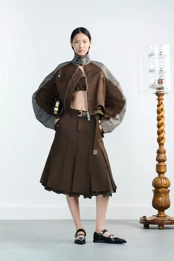 a women wearing sacai brand dress