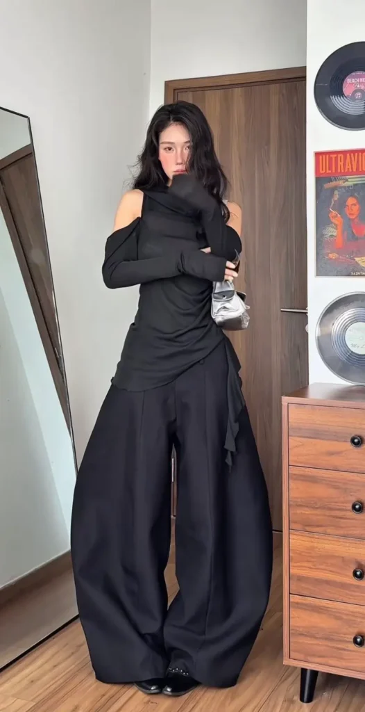 a Women in Monochrome Black Outfits
