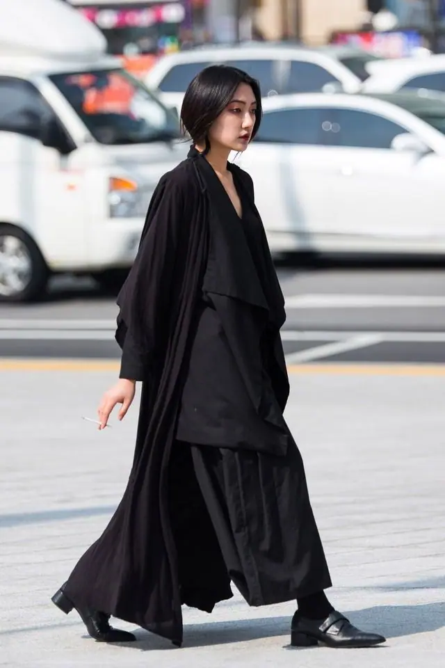 a woman in Seoul street style, oversized dress