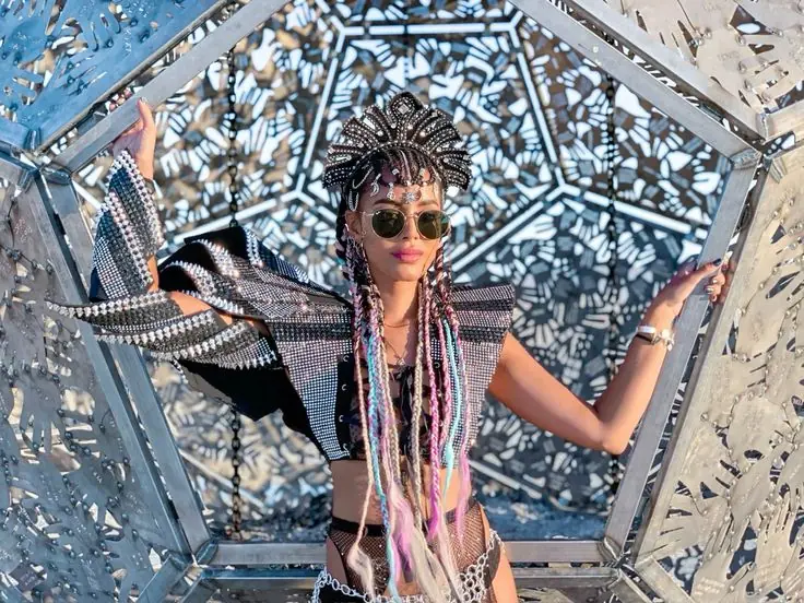 a girl in a futuristic look at Burning Man festival