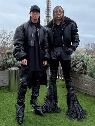 Rick Owens with another man standing